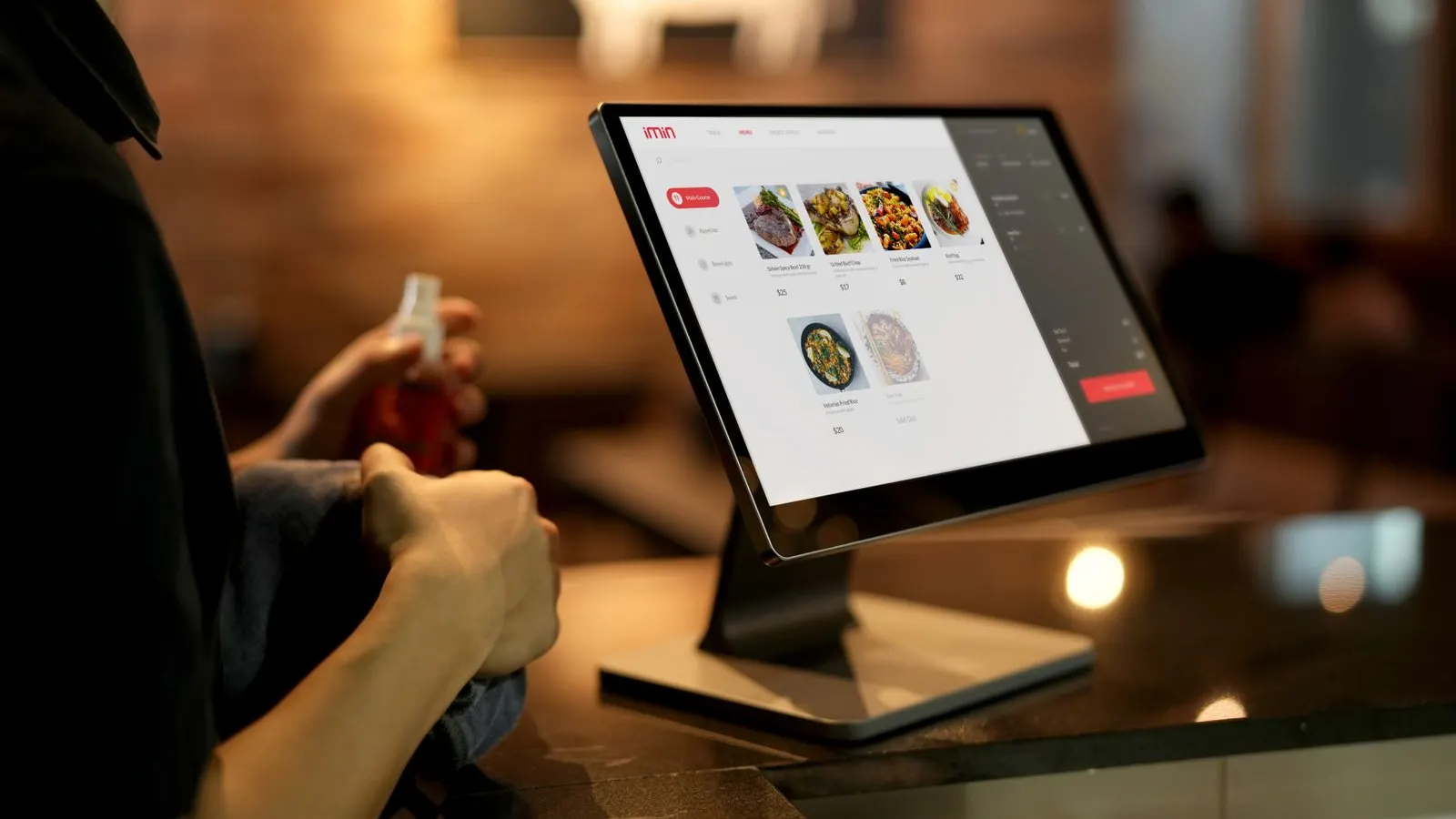 Modern touchscreen EPOS till in a restaurant