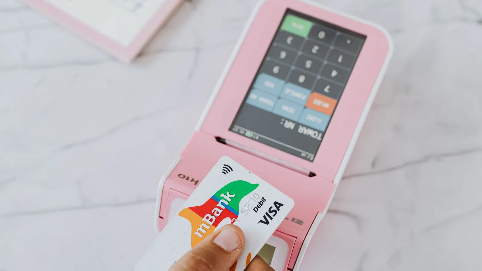 Contactless payment being made with a credit card